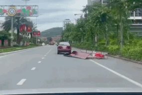 Danh tính nam tài xế lái ô tô kéo lê khung sắt, tấm tôn trên đường ở Quảng Ninh