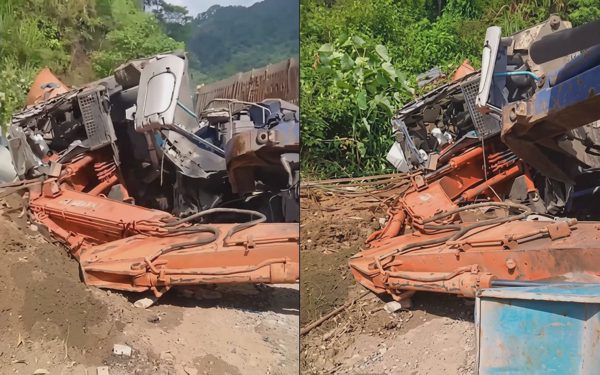 Lật xe tải chở máy múc đè chết hai vợ chồng đi xe máy