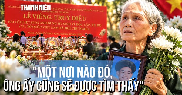 Mang di ảnh người thương đưa tiễn liệt sĩ, mong 'nơi nào đó ông cũng được tìm thấy'
