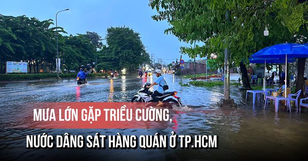 Mưa lớn gặp triều cường, nước dâng sát hàng quán ở TP.HCM