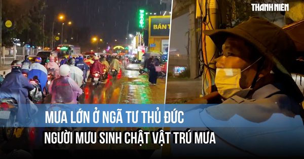 Mưa lớn ở ngã tư Thủ Đức: Người mưu sinh chật vật tìm chỗ trú, shipper tắt app