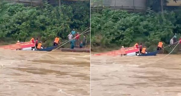 Thuyền đưa người dân vượt lũ qua sông bị chìm
