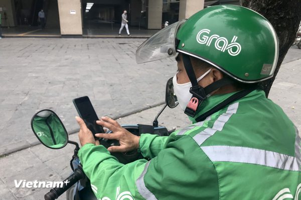 Tìm lời giải “bài toán Grab” để tài xế, doanh nghiệp và hành khách… đều vui