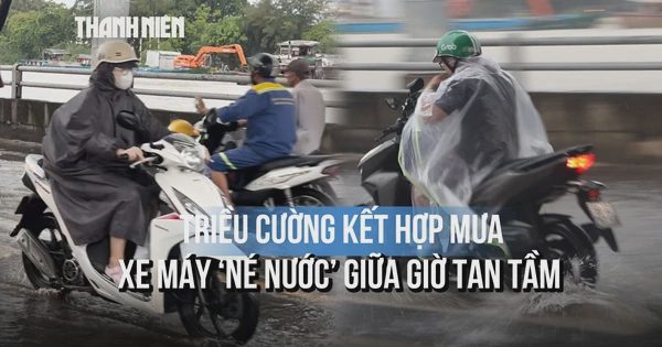Triều cường kết hợp mưa, đường Trần Xuân Soạn ngập đúng giờ tan tầm