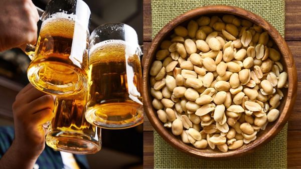 Vì sao khi uống rượu bia không nên dùng lạc làm mồi nhậu?