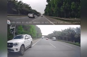 Xe Ford Everest vượt ở làn khẩn cấp rồi bất ngờ dừng lại chặn đầu xe khác