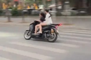 Xử lý cô gái lái xe SH lạng lách, đánh võng trên đường ở Hà Nội